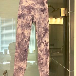 Lululemon Size 4 High Waist leggings. Color is white and a smoky purple NWOT.